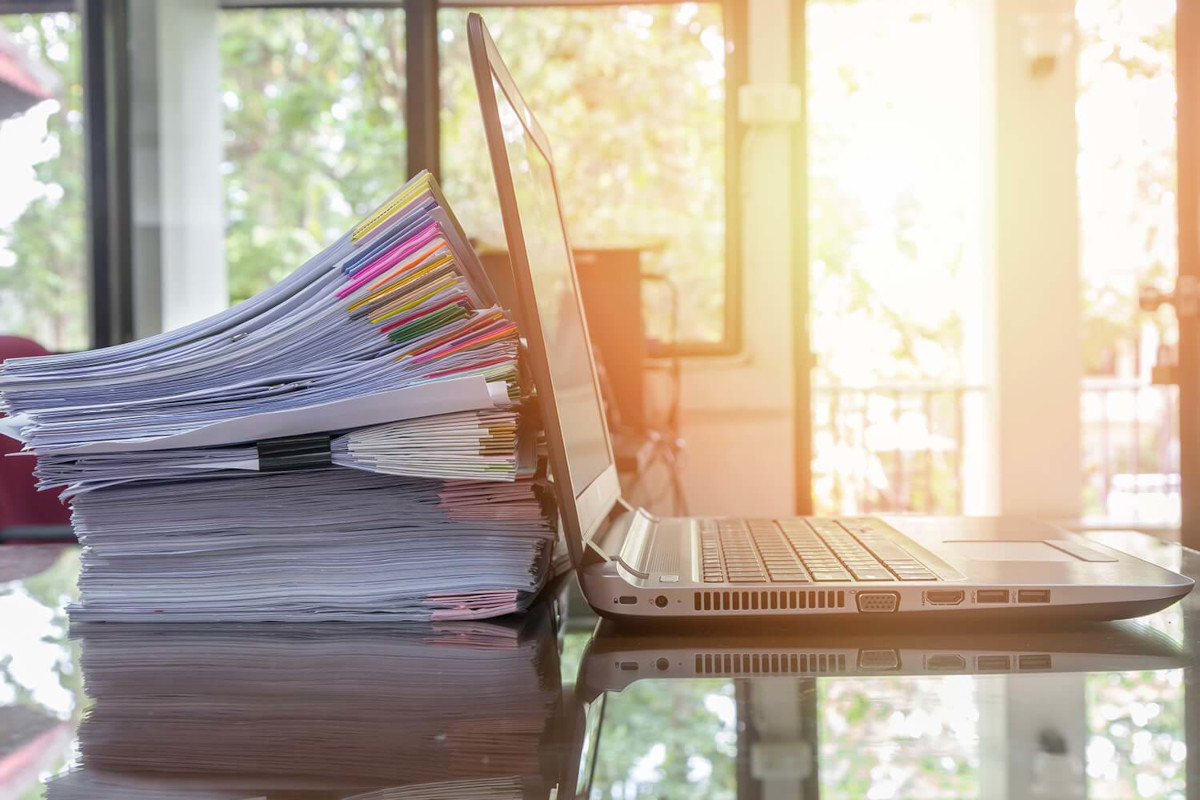 Laptop and document on an office desk
