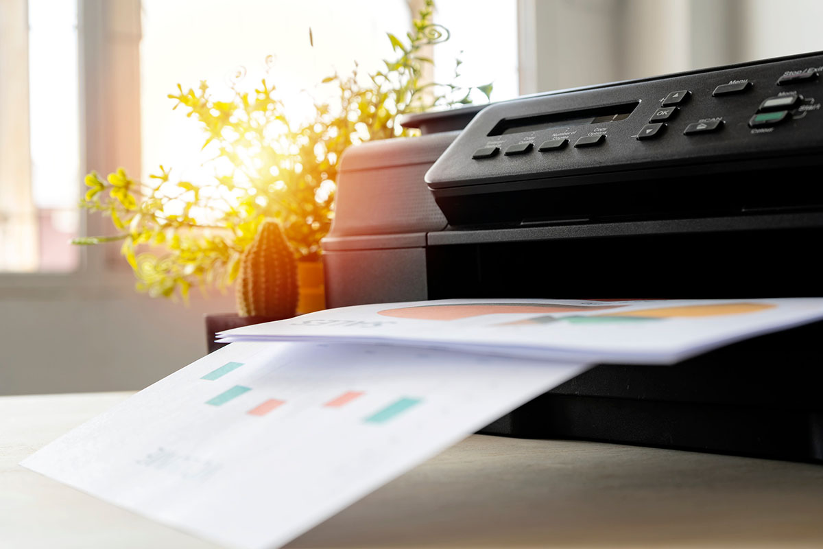 Multifunction printer with multiple pages in the tray