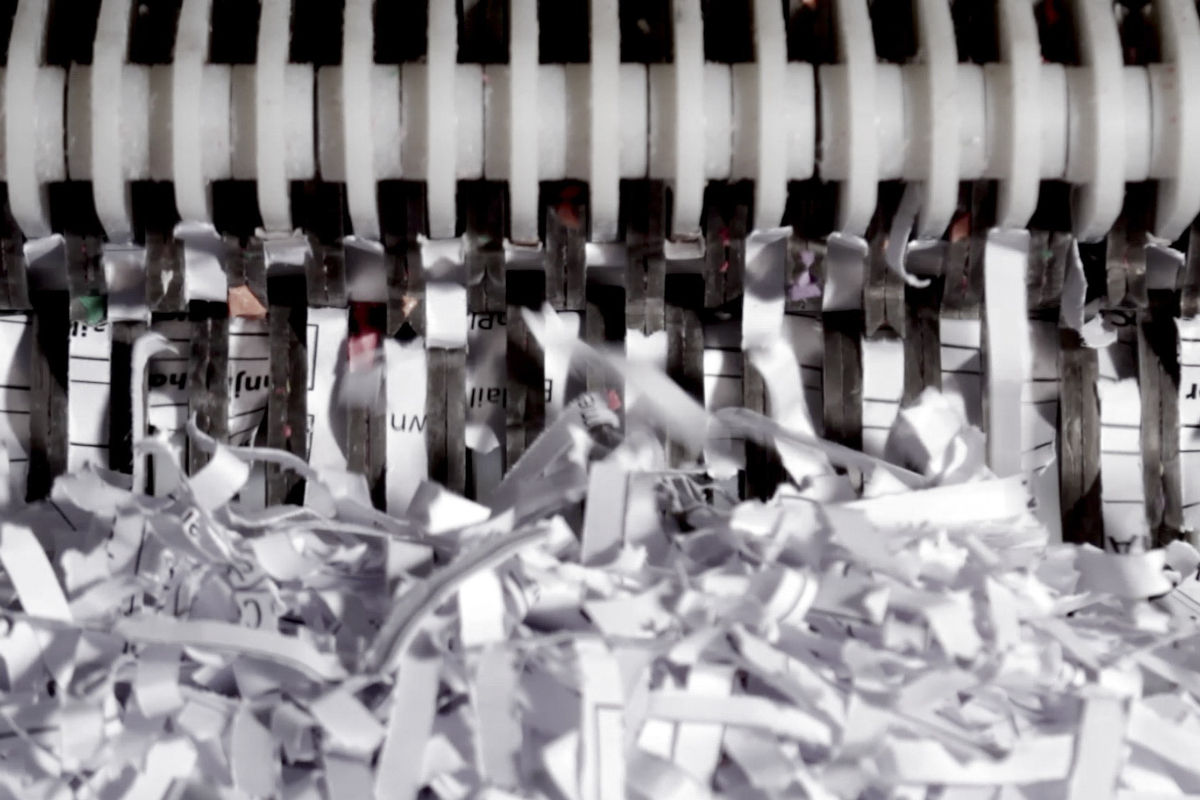 Paper shredder with documents being shredded
