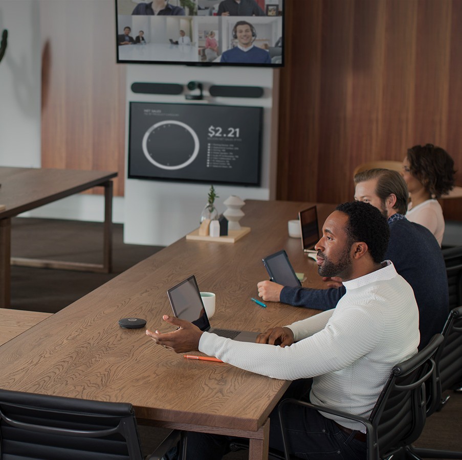 Business people sitting at a desk working